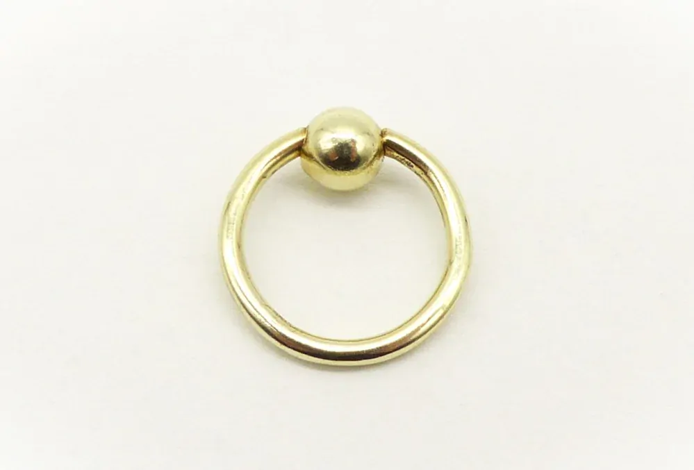 Zlatý piercing 1,40g,