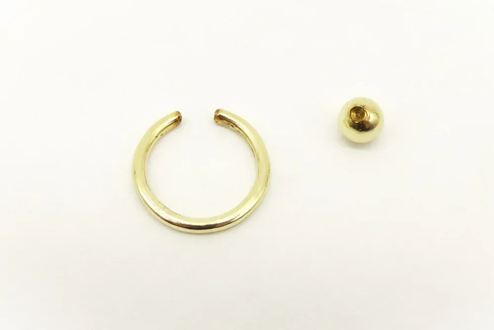 Zlatý piercing 1,40g,