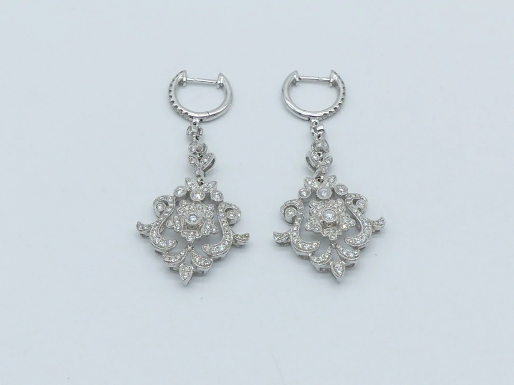 Zlaté náušnice 9,62g, diamanty