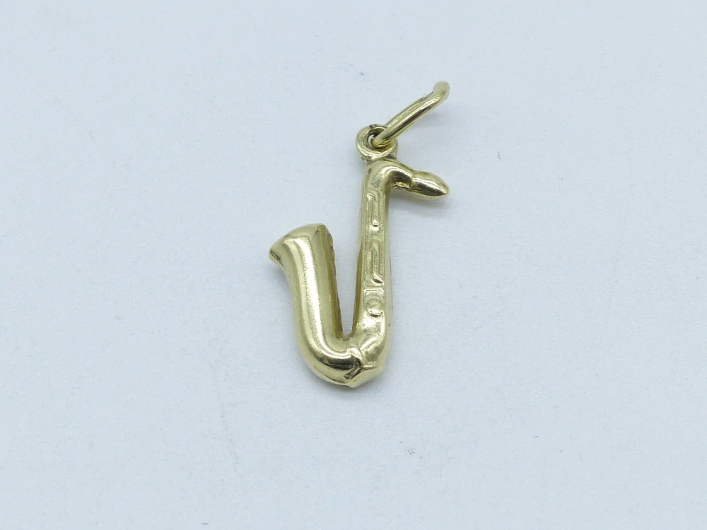 Zlatý přívěsek 0,80g saxofon