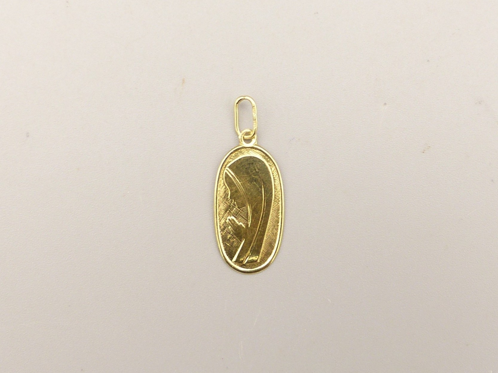 Zlatý přívěsek 0,45g 