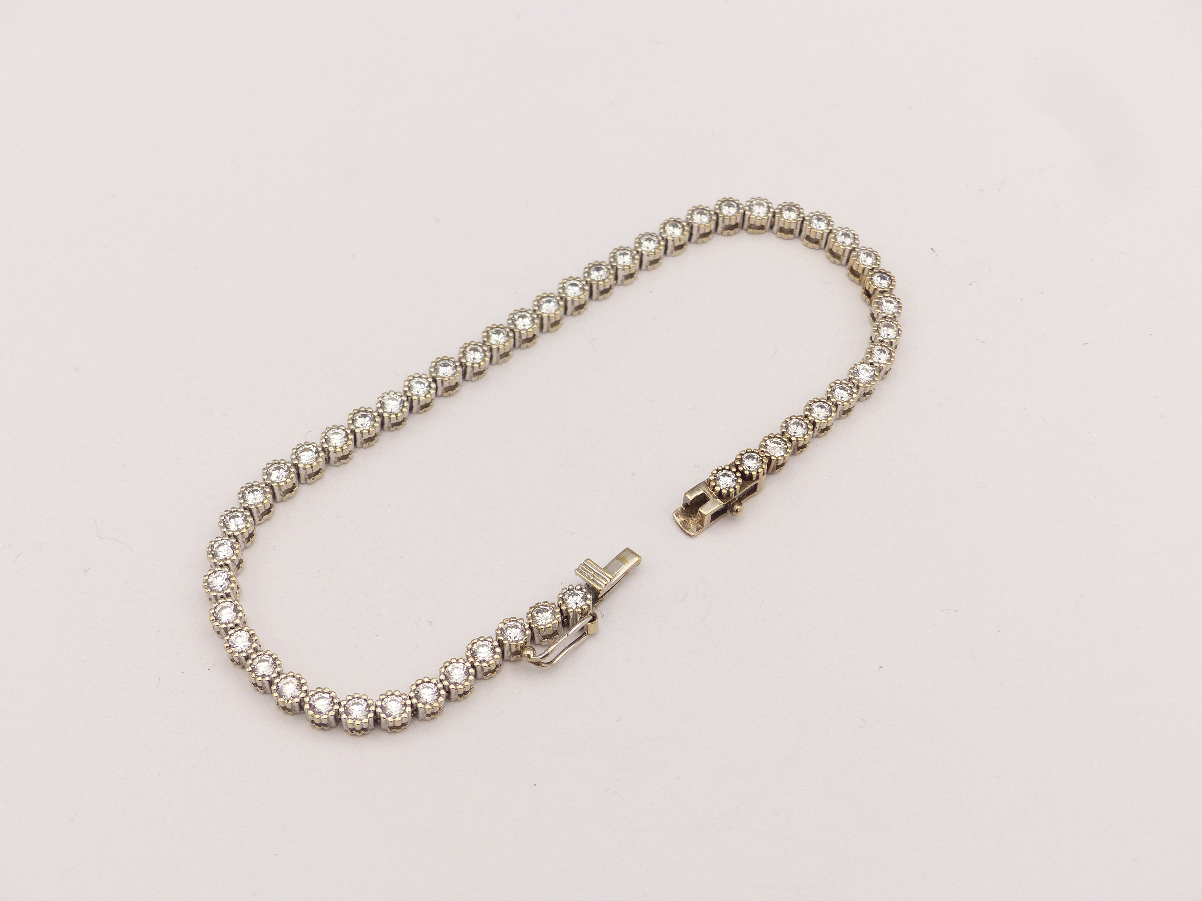 Zlatý tenisový náramek 12,30g délka 19,5 cm