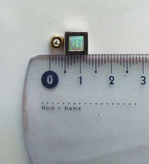 Zlatý přívěsek 1,35g se synt. opálem