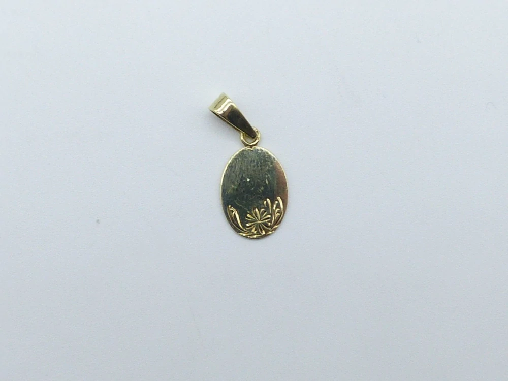 Zlatý přívěsek 0,95g