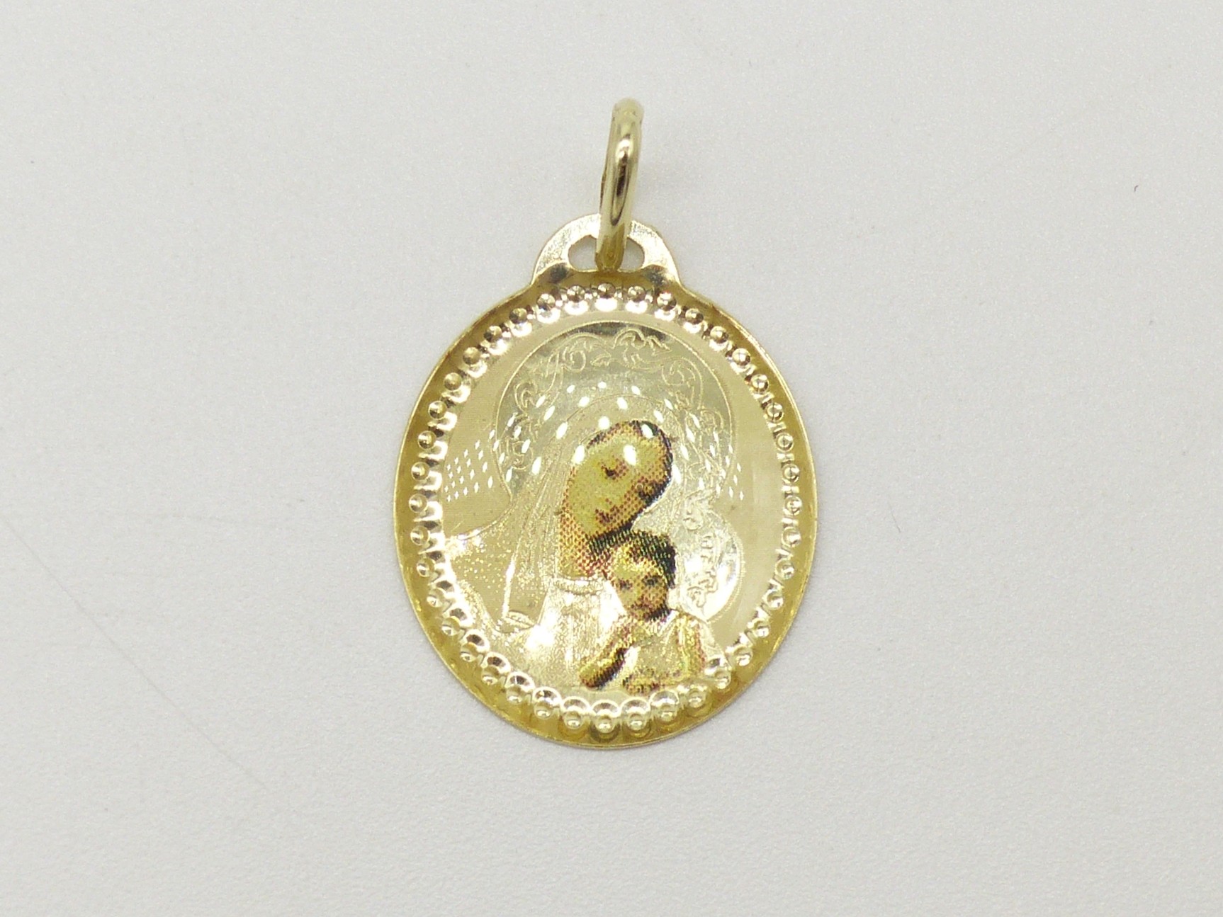 Zlatý přívěsek 1,05g madonka