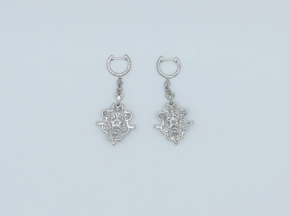 Zlaté náušnice 9,62g, diamanty