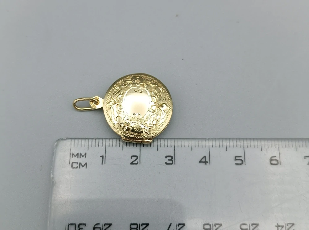 Zlatý přívěsek 5,85g, medailon